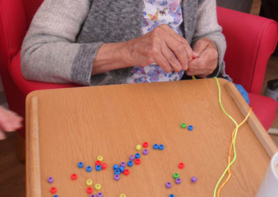 Making friendship bracelets at Woodstock Residential Care Home 1 of 3