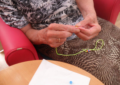 Making friendship bracelets at Woodstock Residential Care Home 3 of 3