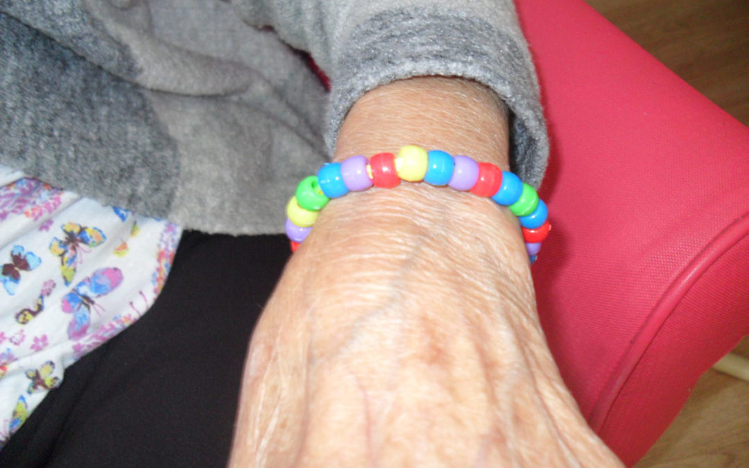 Making friendship bracelets at Woodstock Residential Care Home