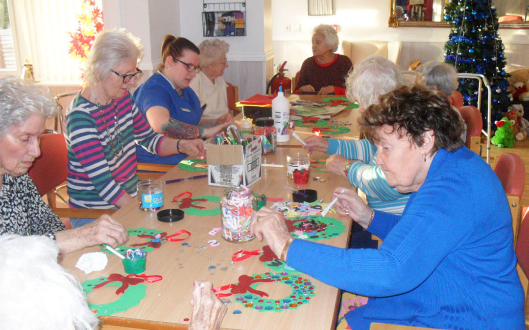 Crafting wreath decorations at Woodstock Residential Care Home