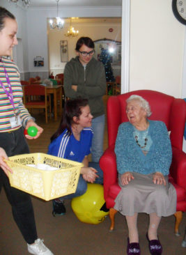 Residents and volunteers from the Princes Trust playing ball games together