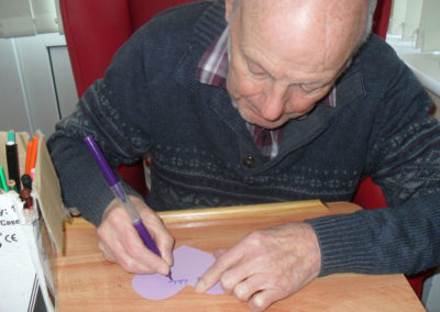 Making Valetine's paper hearts at Woodstock Residential Care Home 5