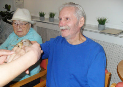 Lulworth House residents meeting a range of Zoolab creatures 1