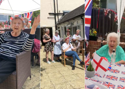 Residents and staff celebrating VE Day in the garden at Woodstock Residential Care Home