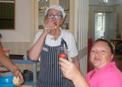 Woodstock Residential Care Home staff toasting with some bubbly