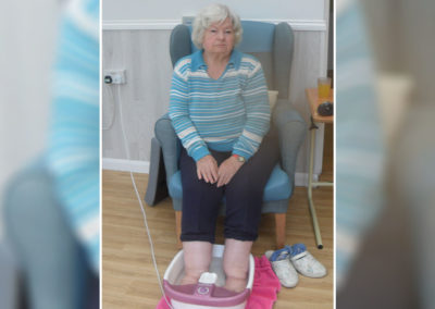 Woodstock Residential Care Home lady resident having a foot spa