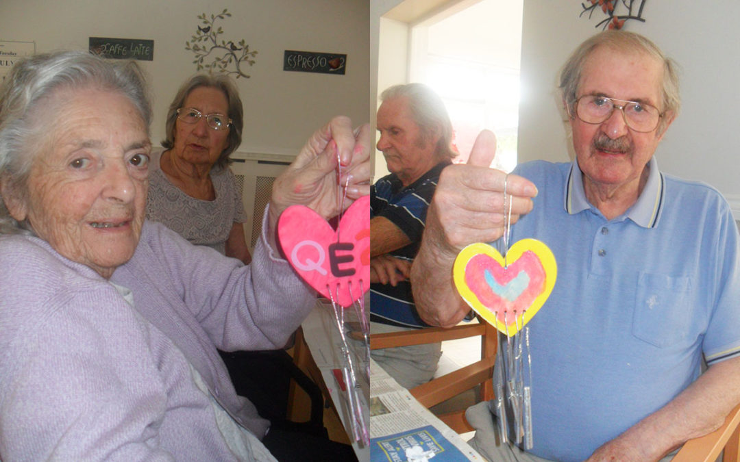 Decorating wind chimes at Woodstock Residential Care Home