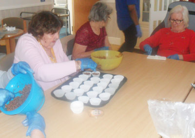 Woodstock Residential Care Home residents making chocolate Rice Krispie cakes for World Chocolate Day 3