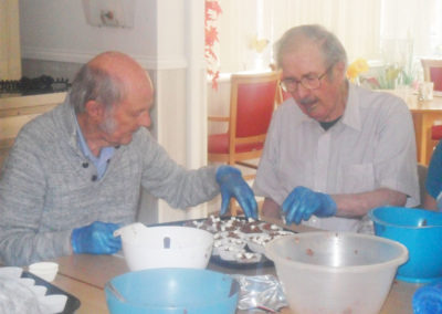 Woodstock Residential Care Home residents making chocolate Rice Krispie cakes for World Chocolate Day 4