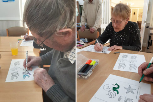 Woodstock Residential Care Home residents colouring underwater sea creatures