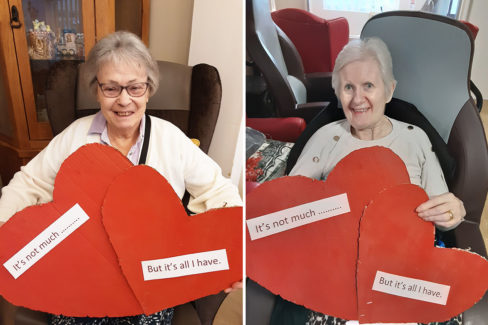 Woodstock Residential Care Home ladies with a heart message for their families