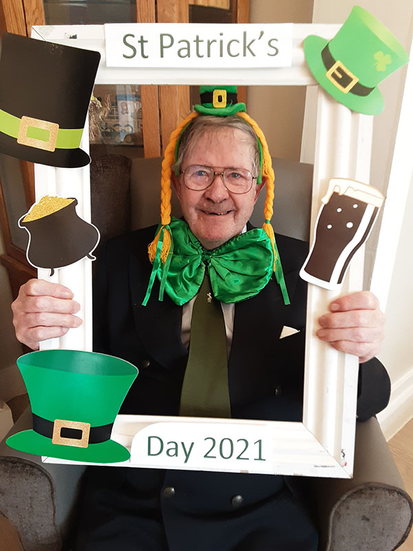Woodstock Residential Care Home residents posing for a St Patricks Day photo