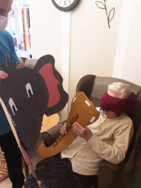 Woodstock Residential Care Home lady playing 'Pin the trunk on the elephant'