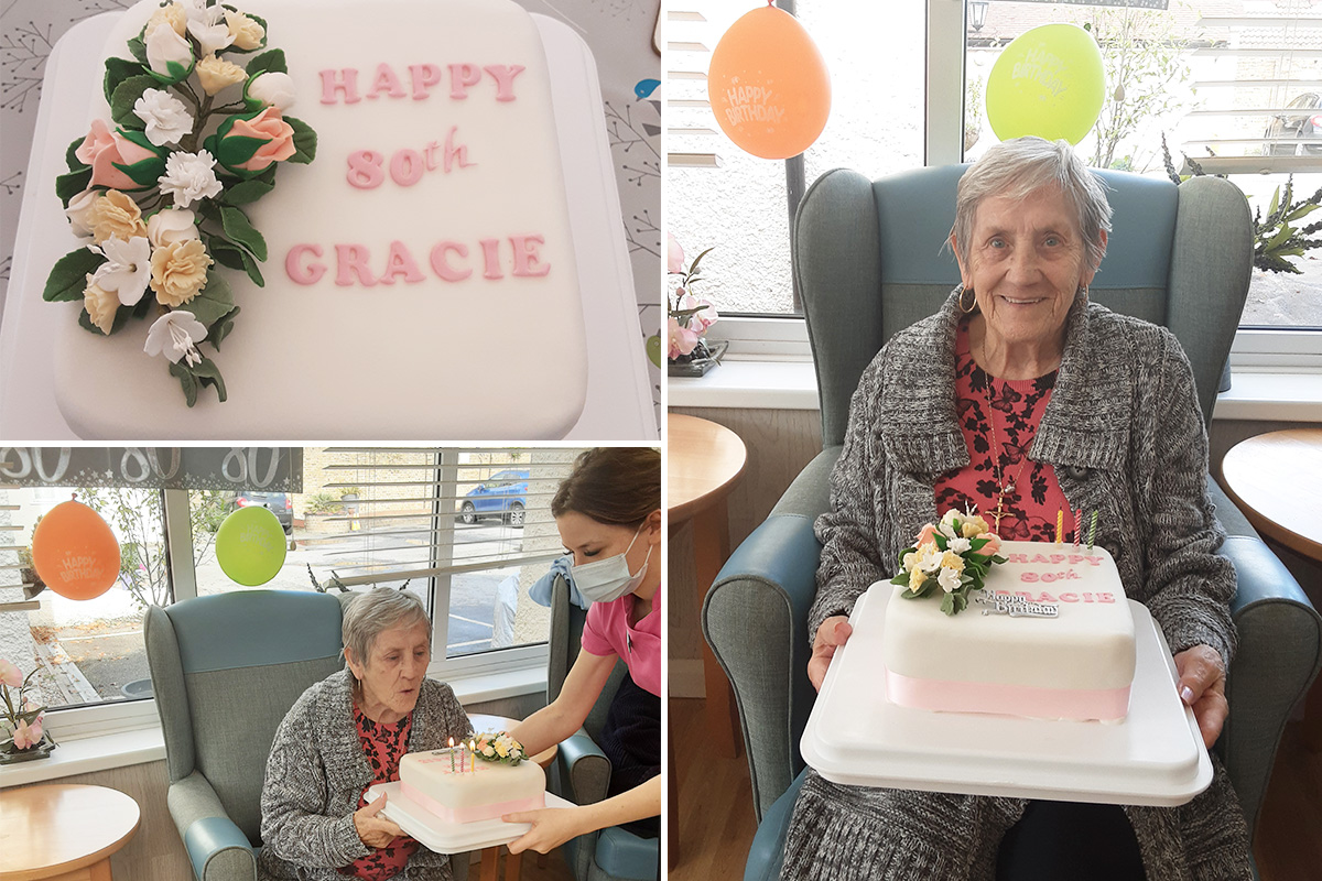 Woodstock Residential Care Home lady resident receiving her birthday cake
