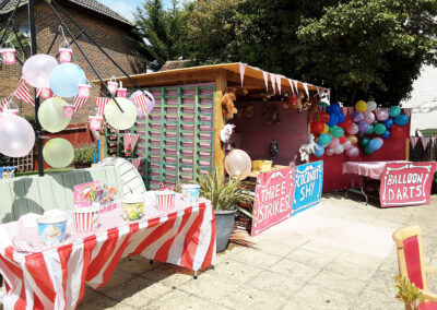 Funfair stalls in the garden at Woodstock Residential Care Home