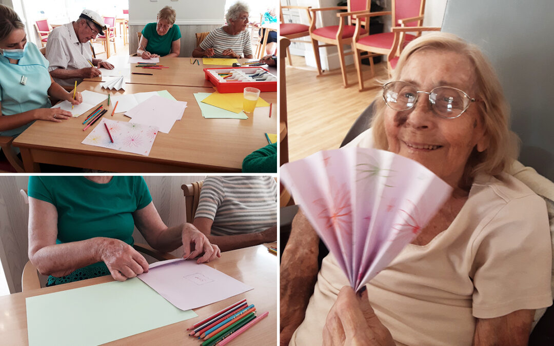 Keeping cool with paper fans at Woodstock Residential Care Home