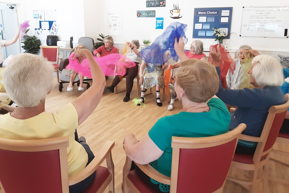 Right Step Dance Company session with scarves at Woodstock Residential Care Home