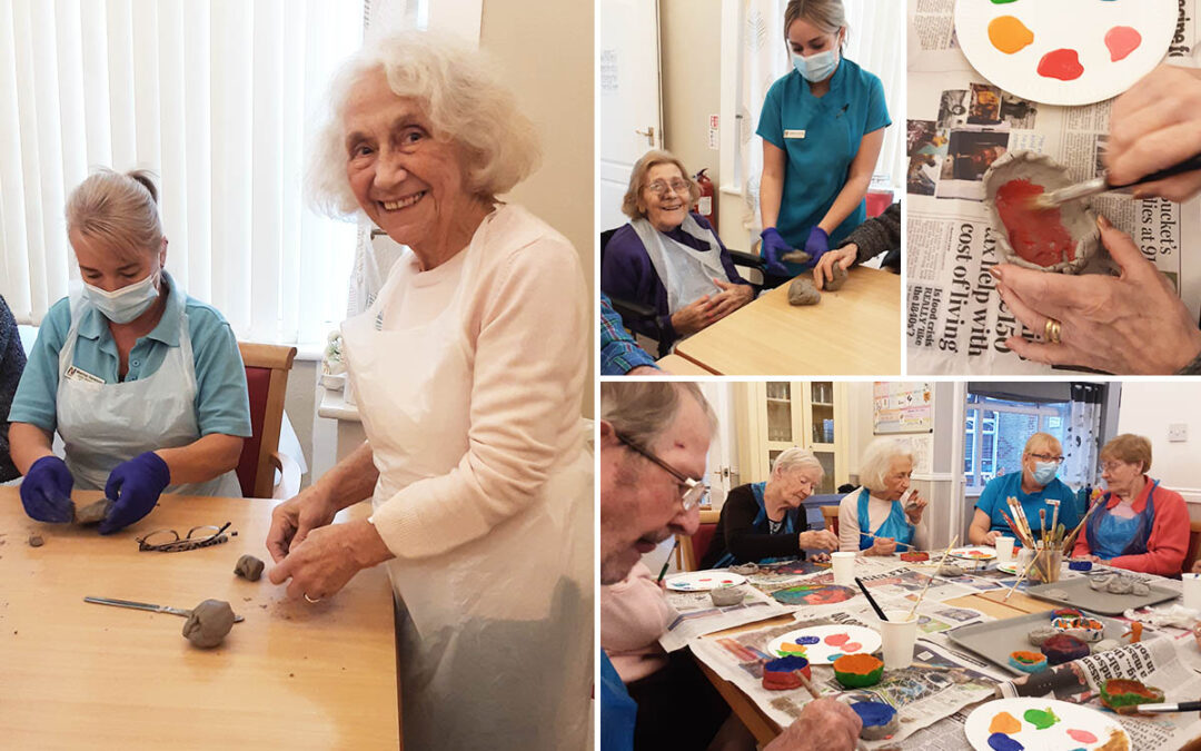 Woodstock Residential Care Home residents enjoy making clay Diwali pots