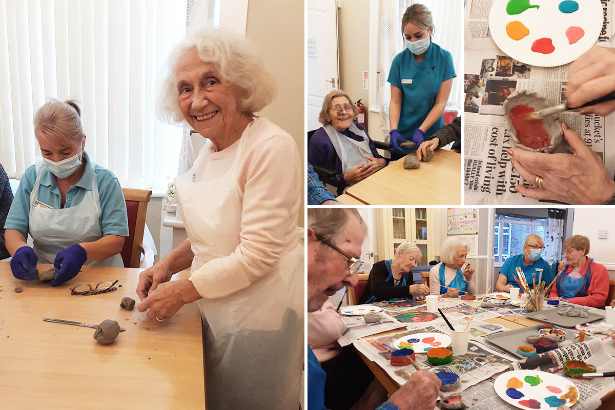 Woodstock Residential Care Home residents enjoy making clay Diwali pots