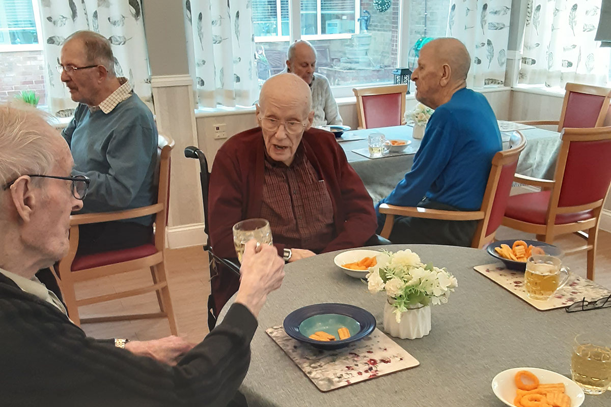 Woodstock Residential Care Home gents enjoying drinks and snacks