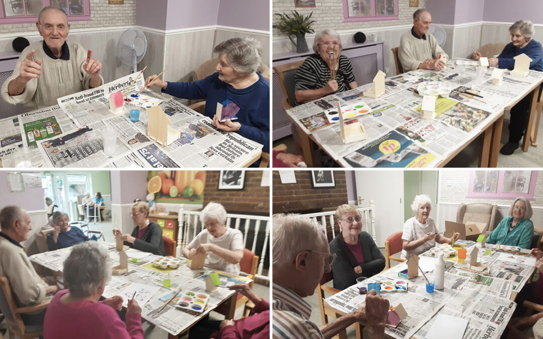 Painting birdhouses at Woodstock Residential Care Home